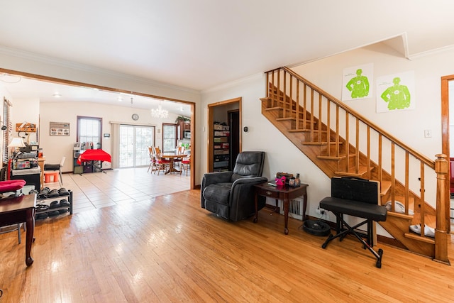 29 Oak Ridge Ave, Hillside, IL 60162 - living area with a chandelier, stairway, wood-type flooring, and crown molding