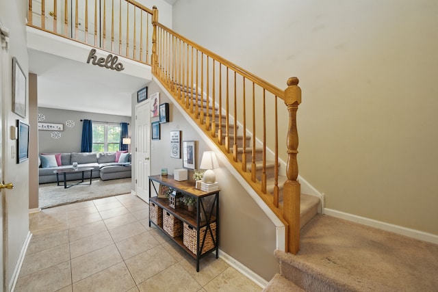10582 Scott Dr, Huntley, IL 60142 - staircase featuring carpet floors and tile patterned floors