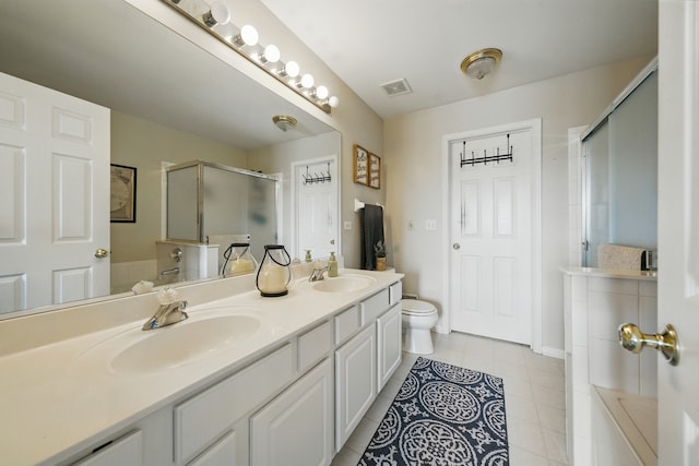 10582 Scott Dr, Huntley, IL 60142 - full bath with a shower with door, double vanity, tile patterned floors, and a tub to relax in