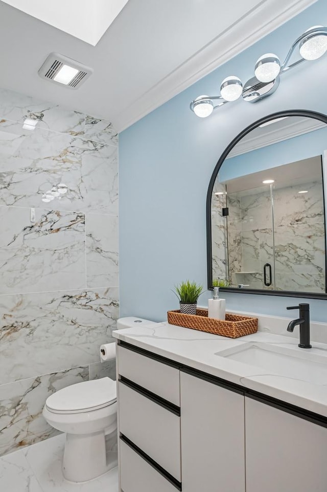 4546 Howard St, Skokie, IL 60076 - full bathroom featuring a marble finish shower, vanity, and marble finish flooring