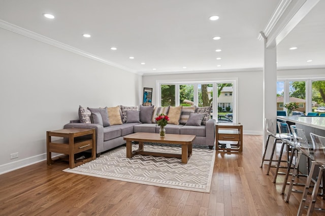 4546 Howard St, Skokie, IL 60076 - living room featuring ornamental molding, hardwood / wood-style flooring, and recessed lighting