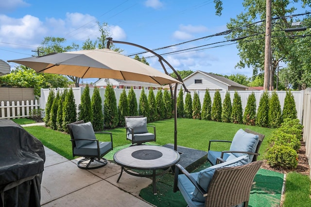 4546 Howard St, Skokie, IL 60076 - fenced backyard with a patio area and a grill