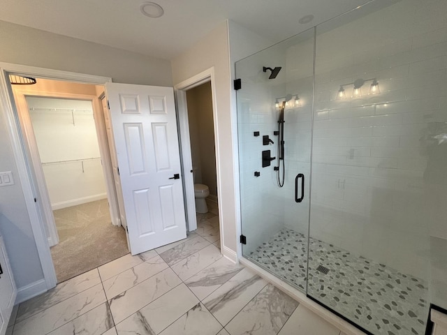 1266 Airs Ave, Sugar Grove, IL 60554 - bathroom featuring a stall shower, marble look tiles, and a spacious closet