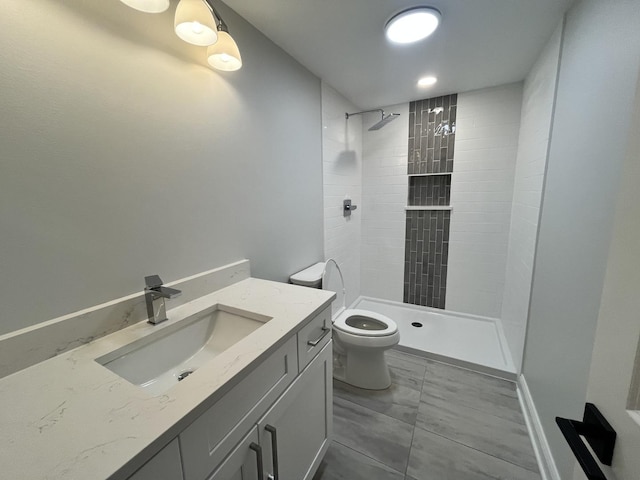 1266 Airs Ave, Sugar Grove, IL 60554 - bathroom with tiled shower, vanity, and marble finish flooring
