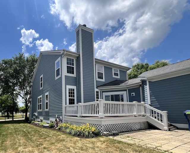 1266 Airs Ave, Sugar Grove, IL 60554 - back of house with a chimney, a deck, and a yard