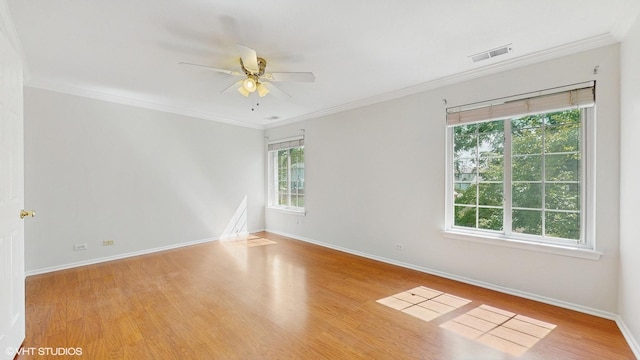 434 Cromwell Cir Unit 3, Bartlett, IL 60103 - spare room with ceiling fan, wood finished floors, and crown molding