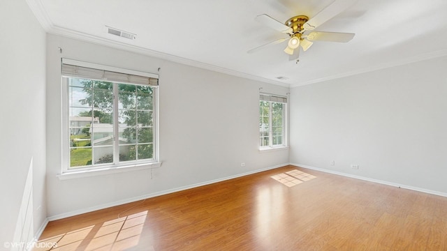 434 Cromwell Cir Unit 3, Bartlett, IL 60103 - empty room with ornamental molding, wood finished floors, and a ceiling fan