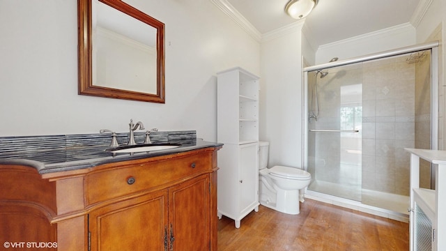 434 Cromwell Cir Unit 3, Bartlett, IL 60103 - bathroom with a tile shower, vanity, crown molding, and wood finished floors