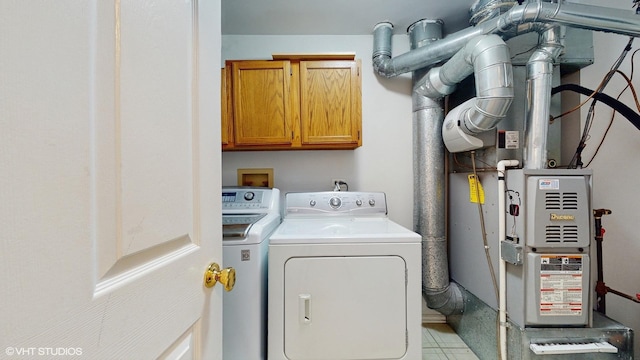 434 Cromwell Cir Unit 3, Bartlett, IL 60103 - laundry area featuring washing machine and clothes dryer, cabinet space, and heating unit