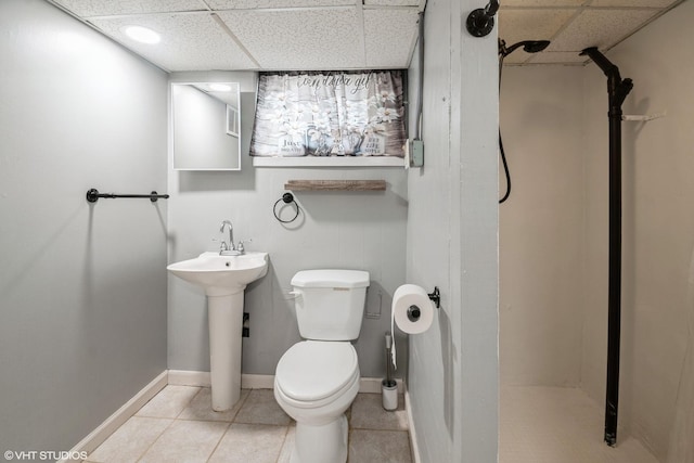 120 S Kinzie St, Thornton, IL 60476 - bathroom featuring a paneled ceiling, a walk in shower, and tile patterned floors