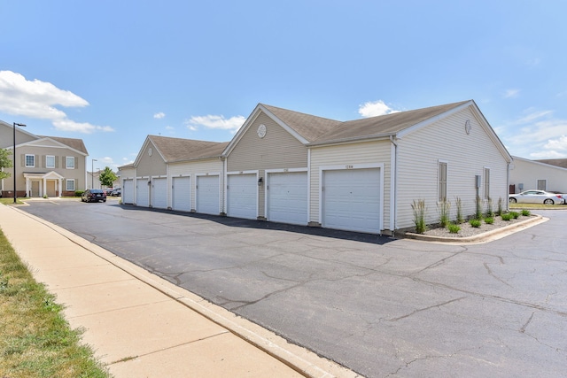128 Bertram Dr Unit M, Yorkville, IL 60560 - view of side of home with community garages