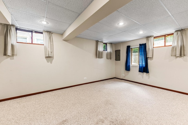 1707 Roosa Ln, Elk Grove Village, IL 60007 - below grade area with a drop ceiling, carpet flooring, recessed lighting, electric panel, and healthy amount of natural light