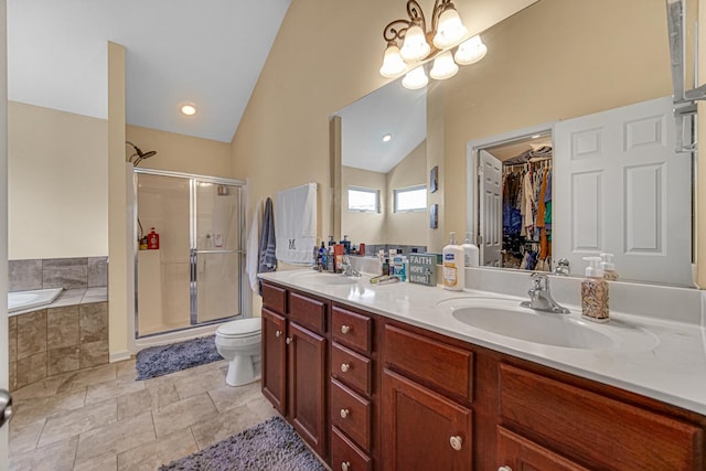 504 W Hillcrest Dr, Romeoville, IL 60446 - bathroom featuring a stall shower, lofted ceiling, double vanity, a garden tub, and a chandelier