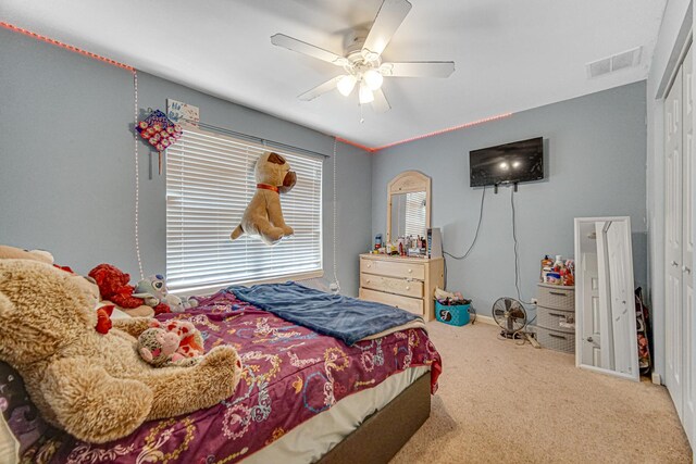 504 W Hillcrest Dr, Romeoville, IL 60446 - carpeted bedroom with ceiling fan and a closet