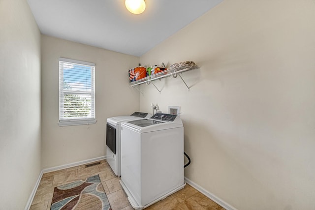 504 W Hillcrest Dr, Romeoville, IL 60446 - washroom with washing machine and clothes dryer and baseboards