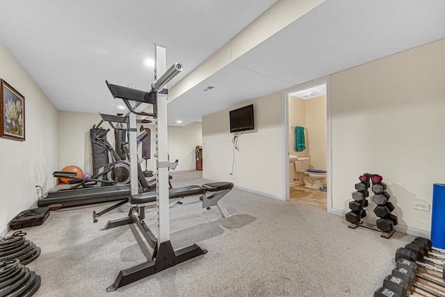 504 W Hillcrest Dr, Romeoville, IL 60446 - workout area featuring carpet flooring and baseboards
