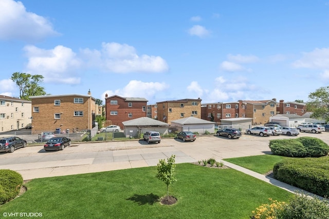 910 Beau Dr Unit 211, Des Plaines, IL 60016 - view of grassy yard featuring a residential view
