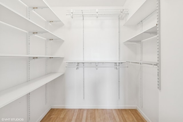 910 Beau Dr Unit 211, Des Plaines, IL 60016 - spacious closet with wood finished floors