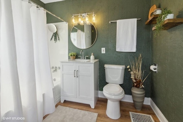 1108 Oakland Ave, Joliet, IL 60435 - bathroom with wood finished floors, vanity, and shower / tub combo