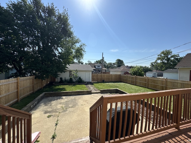 1108 Oakland Ave, Joliet, IL 60435 - fenced backyard with a patio area and a wooden deck