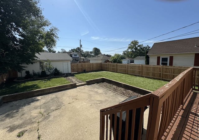 1108 Oakland Ave, Joliet, IL 60435 - fenced backyard with a patio area and an outbuilding