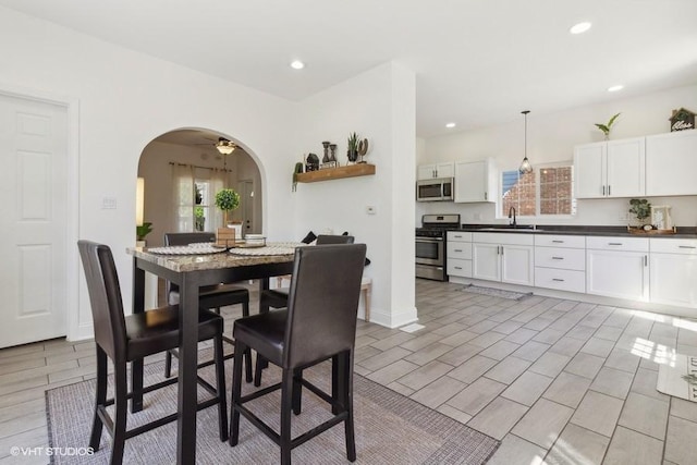 1108 Oakland Ave, Joliet, IL 60435 - dining space featuring arched walkways and recessed lighting