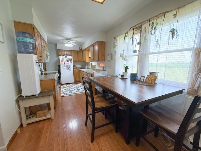 31535 E Thome Rd, Rock Falls, IL 61071 - dining space with light wood-style floors and a ceiling fan
