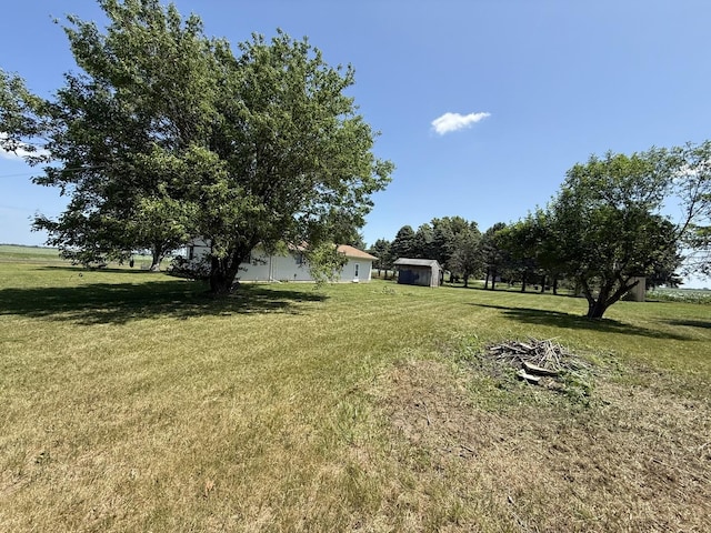 31535 E Thome Rd, Rock Falls, IL 61071 - view of green lawn featuring a storage unit