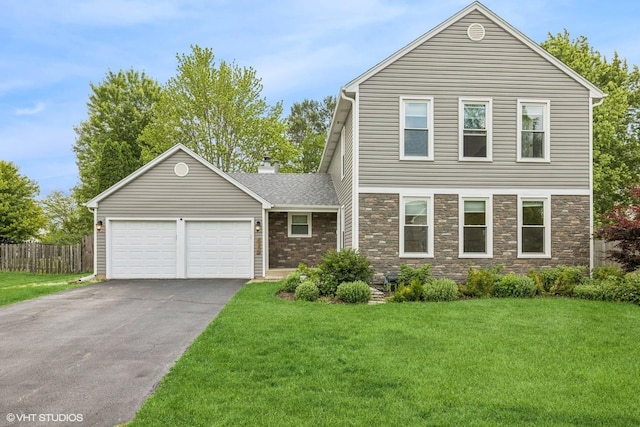 4315 Lombardy Ln, Hoffman Estates, IL 60192 - view of front of home with an attached garage, asphalt driveway, stone siding, and a chimney
