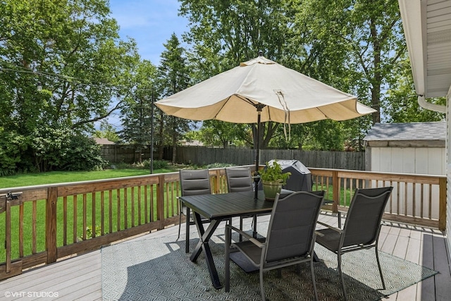 4315 Lombardy Ln, Hoffman Estates, IL 60192 - wooden terrace featuring outdoor dining space, a fenced backyard, and an outbuilding