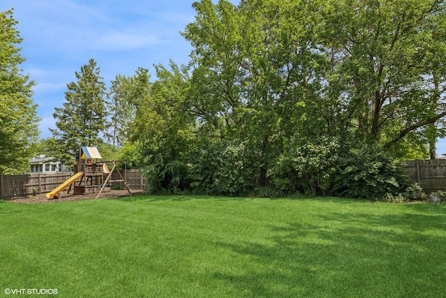 4315 Lombardy Ln, Hoffman Estates, IL 60192 - fenced backyard with a playground