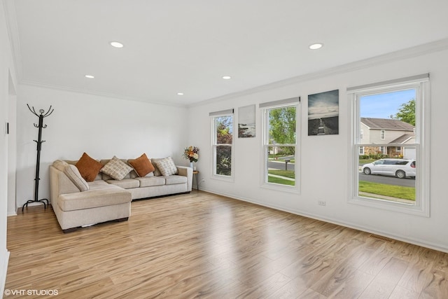 4315 Lombardy Ln, Hoffman Estates, IL 60192 - living area with ornamental molding, plenty of natural light, light wood finished floors, and recessed lighting