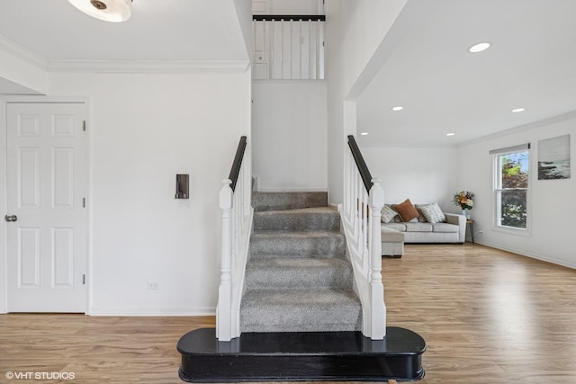 4315 Lombardy Ln, Hoffman Estates, IL 60192 - staircase with crown molding, wood finished floors, and recessed lighting