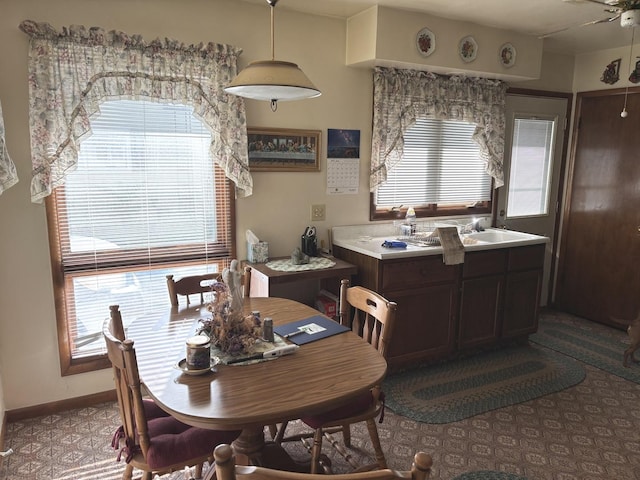 312 Water St, Earlville, IL 60518 - dining area with carpet flooring and a ceiling fan