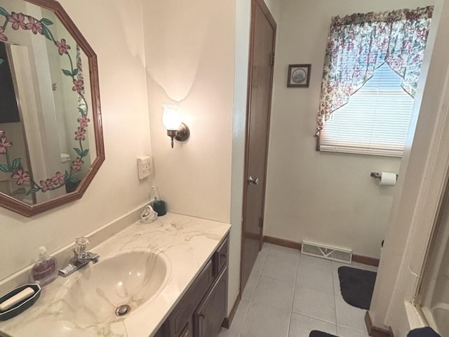 312 Water St, Earlville, IL 60518 - bathroom with vanity and tile patterned floors