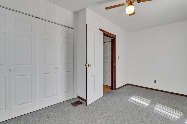 33049 S Symerton Rd, Wilmington, IL 60481 - unfurnished bedroom with carpet floors, a closet, and ceiling fan