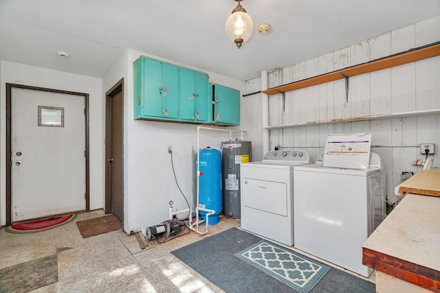 33049 S Symerton Rd, Wilmington, IL 60481 - washroom featuring washer and clothes dryer, electric water heater, and cabinet space