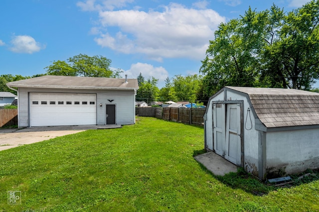 36665 N Traer Ter, Gurnee, IL 60031 - view of yard featuring an outdoor structure and a garage