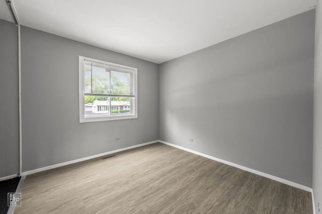 36665 N Traer Ter, Gurnee, IL 60031 - spare room with wood finished floors and baseboards