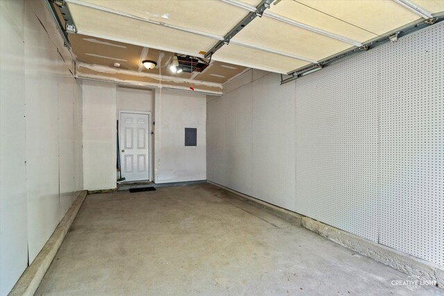 1517 Stoneridge Ct, Yorkville, IL 60560 - garage featuring electric panel and a garage door opener