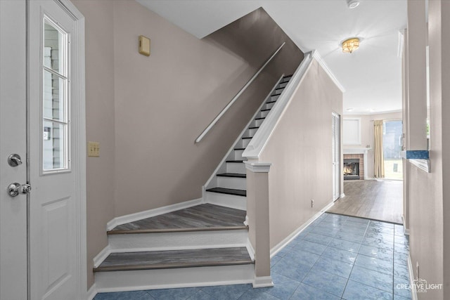 1517 Stoneridge Ct, Yorkville, IL 60560 - stairs featuring a brick fireplace and tile patterned flooring