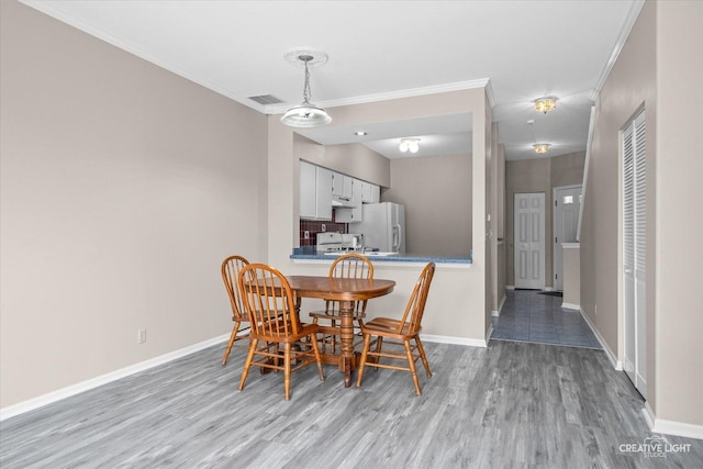 1517 Stoneridge Ct, Yorkville, IL 60560 - dining space with wood finished floors and ornamental molding