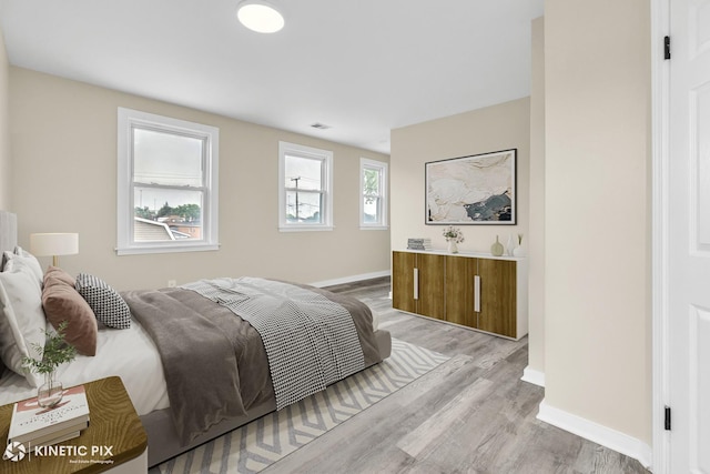 9613 S Yale Ave, Chicago, IL 60628 - bedroom featuring light wood finished floors and baseboards