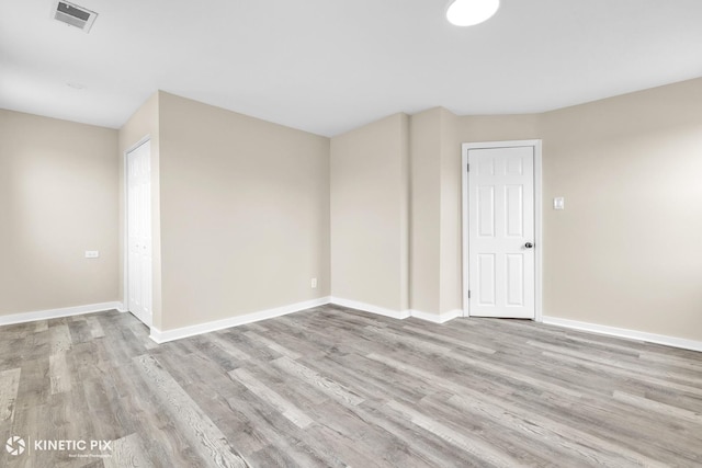 9613 S Yale Ave, Chicago, IL 60628 - spare room featuring wood finished floors and baseboards