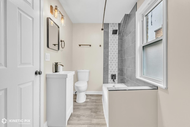 9613 S Yale Ave, Chicago, IL 60628 - bathroom featuring wood finished floors, vanity, a shower, and a tub to relax in