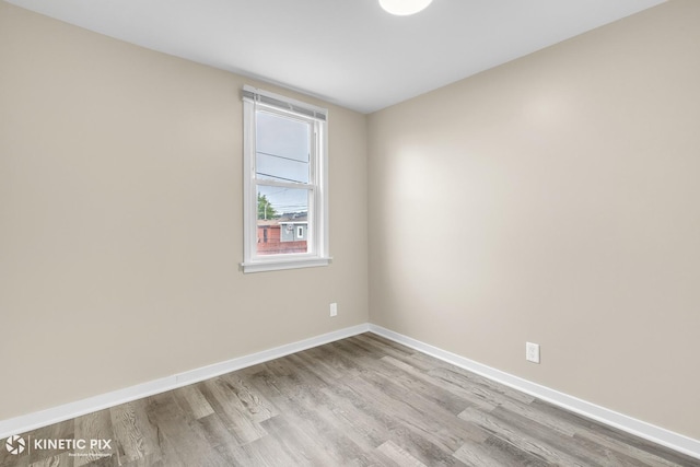 9613 S Yale Ave, Chicago, IL 60628 - unfurnished room featuring wood finished floors