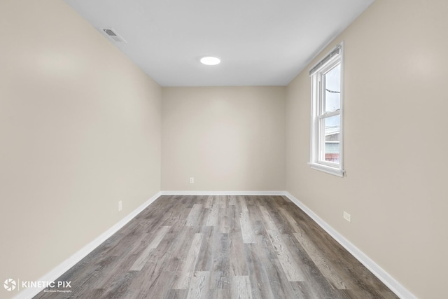 9613 S Yale Ave, Chicago, IL 60628 - spare room with wood finished floors and baseboards