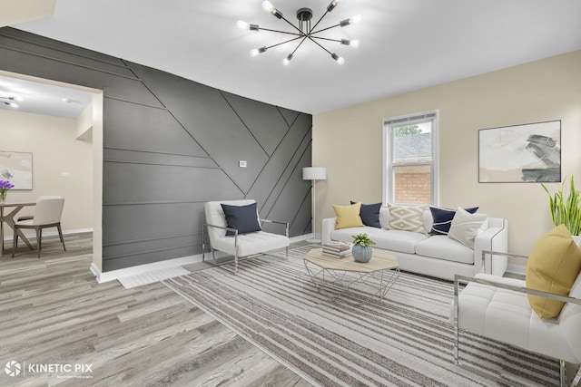 9613 S Yale Ave, Chicago, IL 60628 - living area with a chandelier, light wood finished floors, and a decorative wall