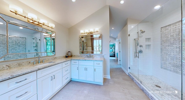 905 Burnham Ct, Aurora, IL 60502 - full bath featuring a shower stall, vaulted ceiling, double vanity, and recessed lighting