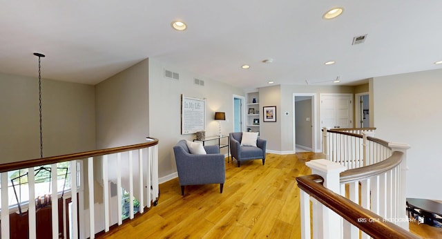 905 Burnham Ct, Aurora, IL 60502 - hall featuring an upstairs landing, attic access, recessed lighting, and light wood-type flooring